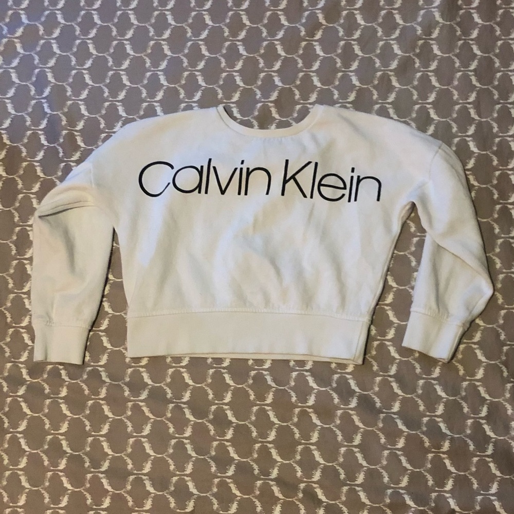 White Calvin Klein shirt. 8/10. super cute.